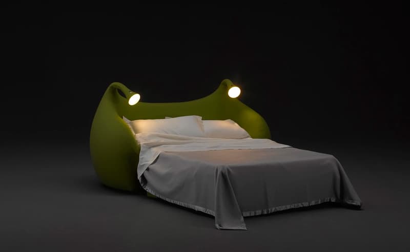 The multipurpose Morfeo Sofa Bed that resemblance a bit of a frog or Shrek, features two adjustable lights placed on antennas. 