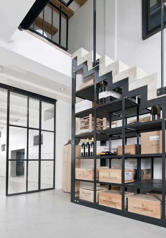 concrete and steel stairs with storage space