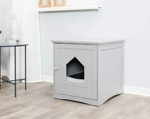 wooden side table doubles as cat home with litter box