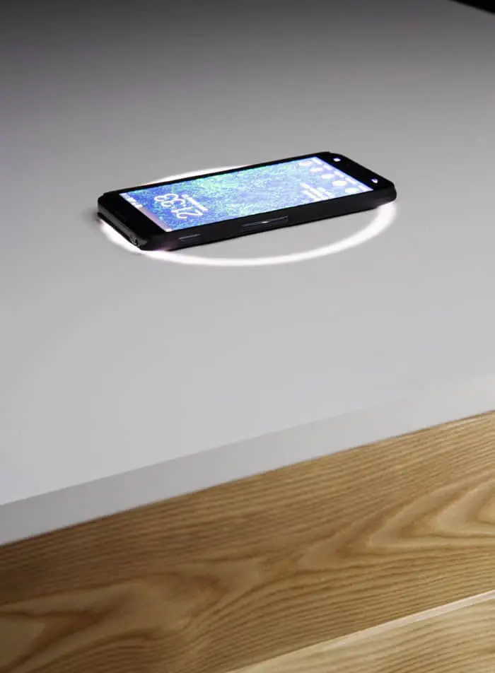 desk with built in wireless phone charger
