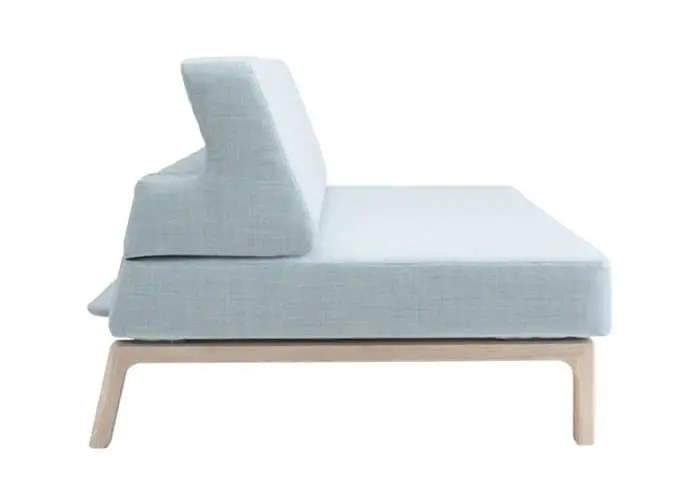 The backrest of the minimalistic designed Lazy Sofa Bed can be folded forward to turn it into a daybed or guest bed.