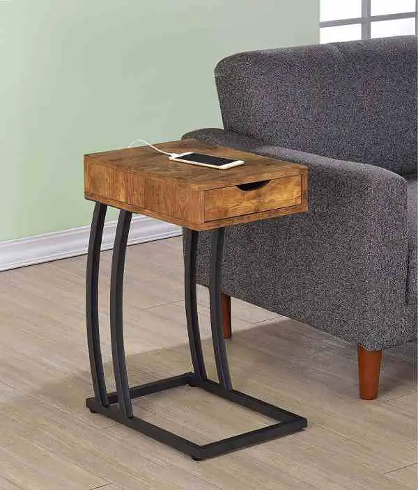 The lovely Fandango hi-tech accent table has two USB ports and two grounded plug-ins on the back to charge four devices at once.