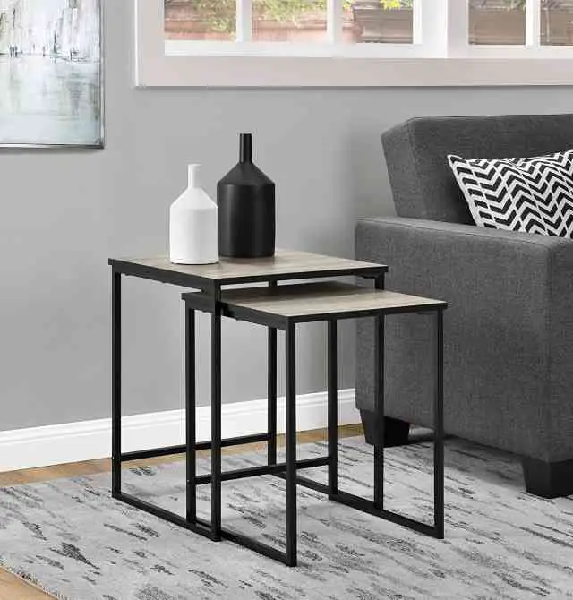 two sturdy nesting tables with metal legs