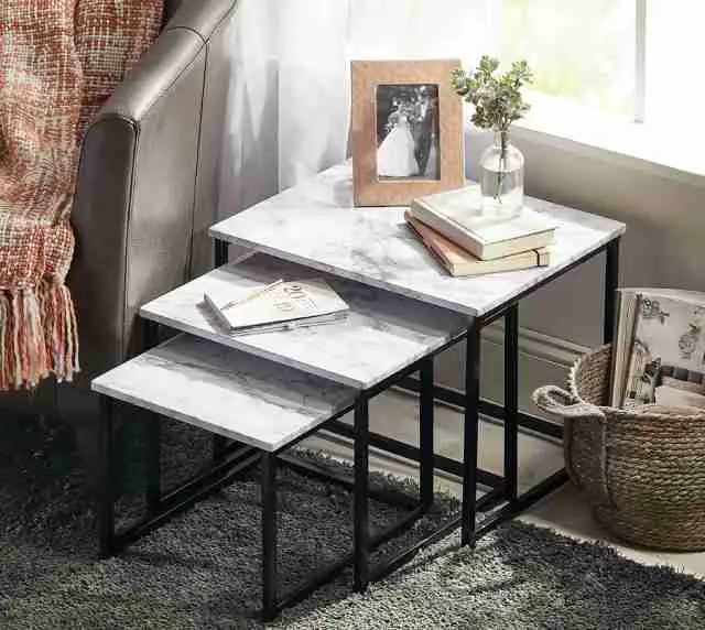 three nesting side-end tables with marble tabletops