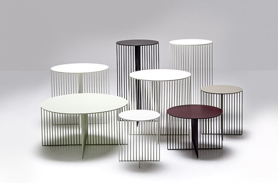Overlapping side tables with shapes ranging from classic round to sharply-edged rectangles