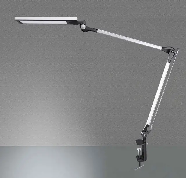 The Phive Architect Lamp is a swing arm lamp with memory function. This modern functional and adjustable clamp lamp illuminates your work surface or reading corner with super bright LED light.