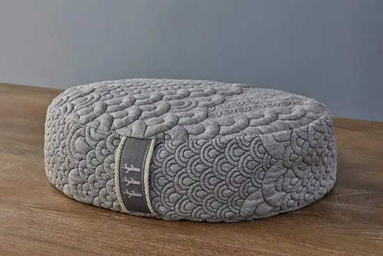 Crystal Cove plush meditation cushion with carry handle weighs only four pounds, so it's lightweight enough to carry anywhere.