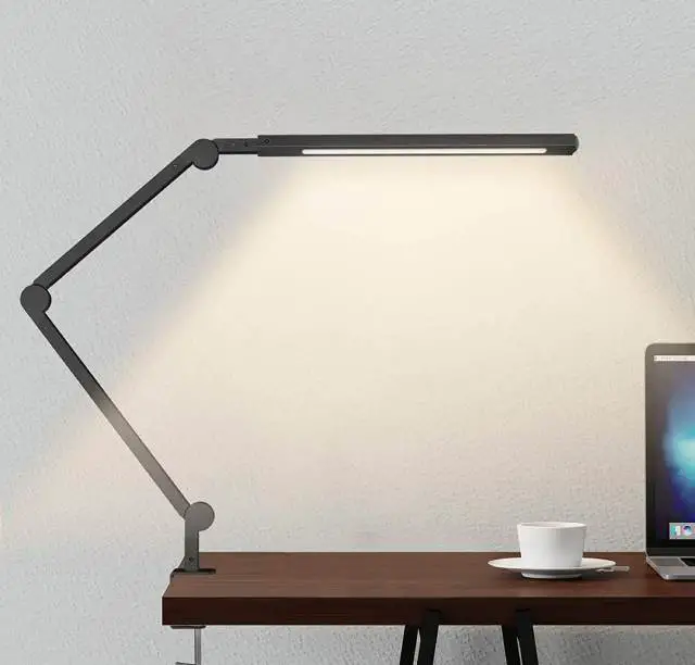 JOLY JOY's Architect Desk Lamp provides a wide range of light and comes with its own auto-off timer that helps save electricity. 