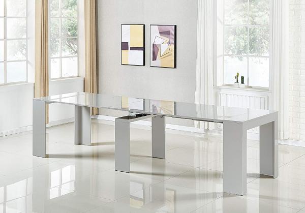 MiniMax extendable console table features five table leaves that fit neatly into extendable rails an can seat up o 12 people for dinner.