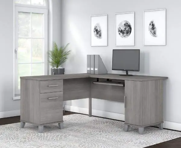 l-shaped desk with cabinet and closed file drawer