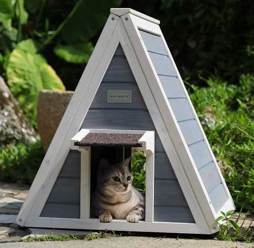 outdoor cat house with a pitched roof