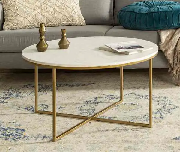 round faux marble coffee table with X metal base